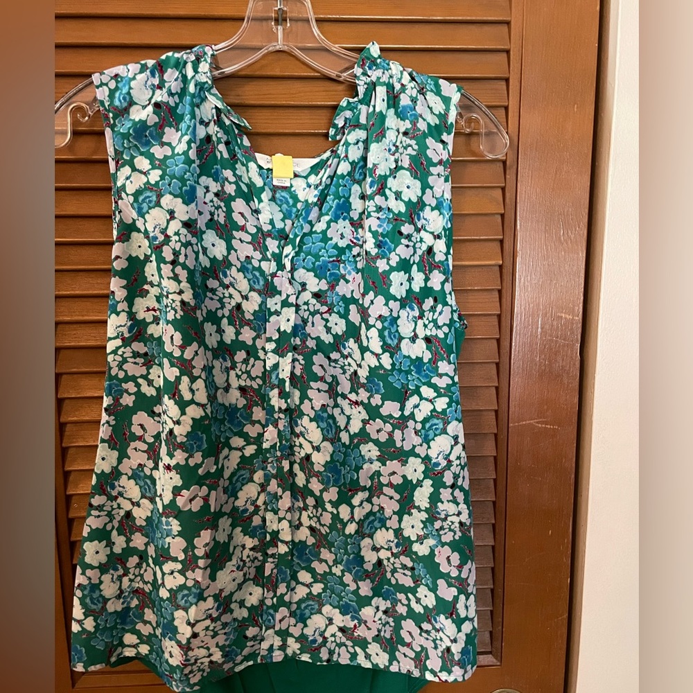 Lovely teal flowered silk- like blouse. Worn once.